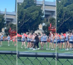 Former Geelong player Billie Smedts jumps fence to celebrate Mitch Duncan’s final VFL goal