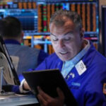 Asian shares are mostly higher after a mixed finish on Wall Street