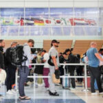 A downturn in international travel to the U.S. may last beyond summer, experts warn