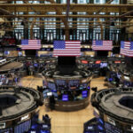 Wall Street indexes end up as investors weigh inflation data