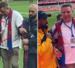 Imposter wearing ex-player’s accreditation arrested after joining AFL grand final celebrations