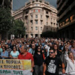 Thousands march in Greece against labor law changes, disrupt services nationwide