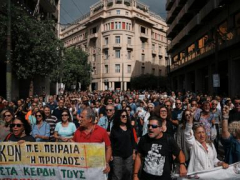 Thousands march in Greece against labor law changes, disrupt services nationwide