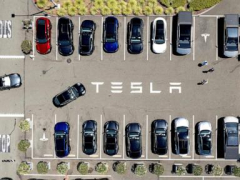 Parents of woman killed in Tesla crash allege design flaw trapped her in burning car