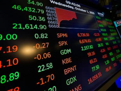Asian shares are mixed as tech shares lead Wall Street ticks to more records