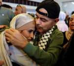 Israel celebrates releases, warns Palestinians over reunion scenes