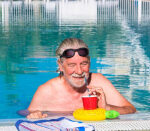I’m 77. Despite my $1.4 million wealth, my expenses exceed my income. Do I sell stocks to pay off my mortgage?