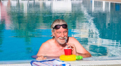I’m 77. Despite my $1.4 million wealth, my expenses exceed my income. Do I sell stocks to pay off my mortgage?