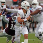 Arch Manning injury update: Texas QB in concussion protocol, misses Monday practice