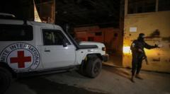 Hamas returns remains of two more hostages but says more time needed to reach others