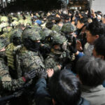 South Korea’s former PM, spy chief arrested over martial law declaration