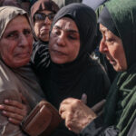 Israel kills four Palestinians in Gaza; fighters recover body of captive