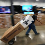 US retail sales rose slightly in September, adding to months of big gains