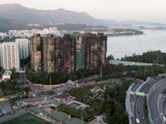 Hong Kong firefighters make final search, apartment tower blaze kills 128