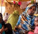 Fear of mass killings as thousands trapped in besieged Sudan city taken by militia group