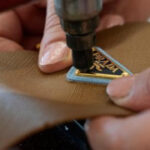 Prada Group says it has purchased fashion rival Versace in a deal worth nearly $1.4 billion