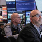 Asian shares are mixed after Wall Street pulls near its all-time high