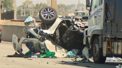 Kwinana Freeway cleared and trains back up and running after serious crash