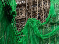 Hong Kong residents and experts defend bamboo scaffolding after deadly fire