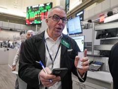 Asian shares are mixed after Wall Street inches closer to its all-time high