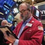 World shares are mixed as Oracle’s earnings revive AI worries, hitting technology shares