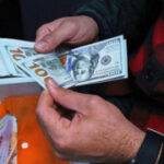 Iran’s rial currency plummets to new low, sparking fears of higher food prices