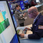 Asian shares follow Wall Street lower as AI worries drag tech stocks lower