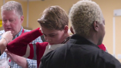 Prince George helps serve up Christmas lunch at homeless shelter