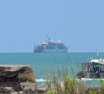 Queensland cruise ship runs aground off Papua New Guinea coast, moths after death of passenger on Lizard Island