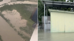 Queensland floods turn fatal as towns cut off by double weather systems