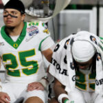 Oregon feels pain of another CFP blowout loss in Peach Bowl: ‘Moment is going to hurt’
