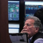 US futures slip while Asian shares surge as Fed chair Powell faces legal threat