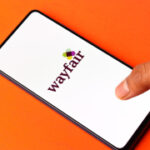 Wayfair is selling a $330 TV stand with sliding barn doors for only $147