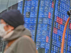 Asian shares are mixed after Wall St sets a record, and the US dollar’s value slides further