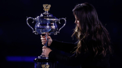 Tennis legend Jennifer Capriati steps out in rare public appearance to present trophy at Australian Open