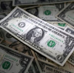 Dollar set for strongest week since November, yen steadies before polls