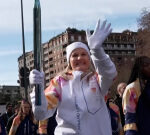 Olympic torch travels through central Milan hours before games