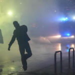 Italian police fire tear gas as protesters clash near Olympics hockey venue