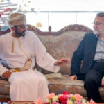 Top Iran security official is in Oman, site of talks with the US, likely with a nuclear message