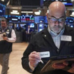 Asia shares lower after sharp Wall Street losses on AI-related worries