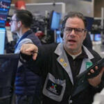 A quiet finish for Wall Street masks some churning beneath the surface