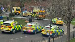 Man held after five people attacked in hospital