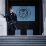 Man with shotgun running towards US Capitol building arrested by police