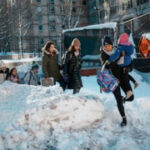 Northeast US digs out from brutal snowstorm that disrupted flights and canceled school