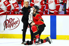 Brady Tkachuk bloodied by big hit, gets misconduct penalty in NHL return