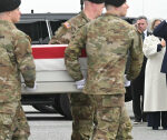 Trump salutes as 6 soldiers killed in Iran are transferred back to the U.S.