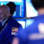 Asian shares surge, echoing rally on Wall Street as oil prices sank back to about $90