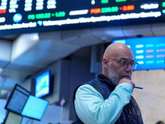 Wall Street ticks up modestly as investors await a major release of oil reserves